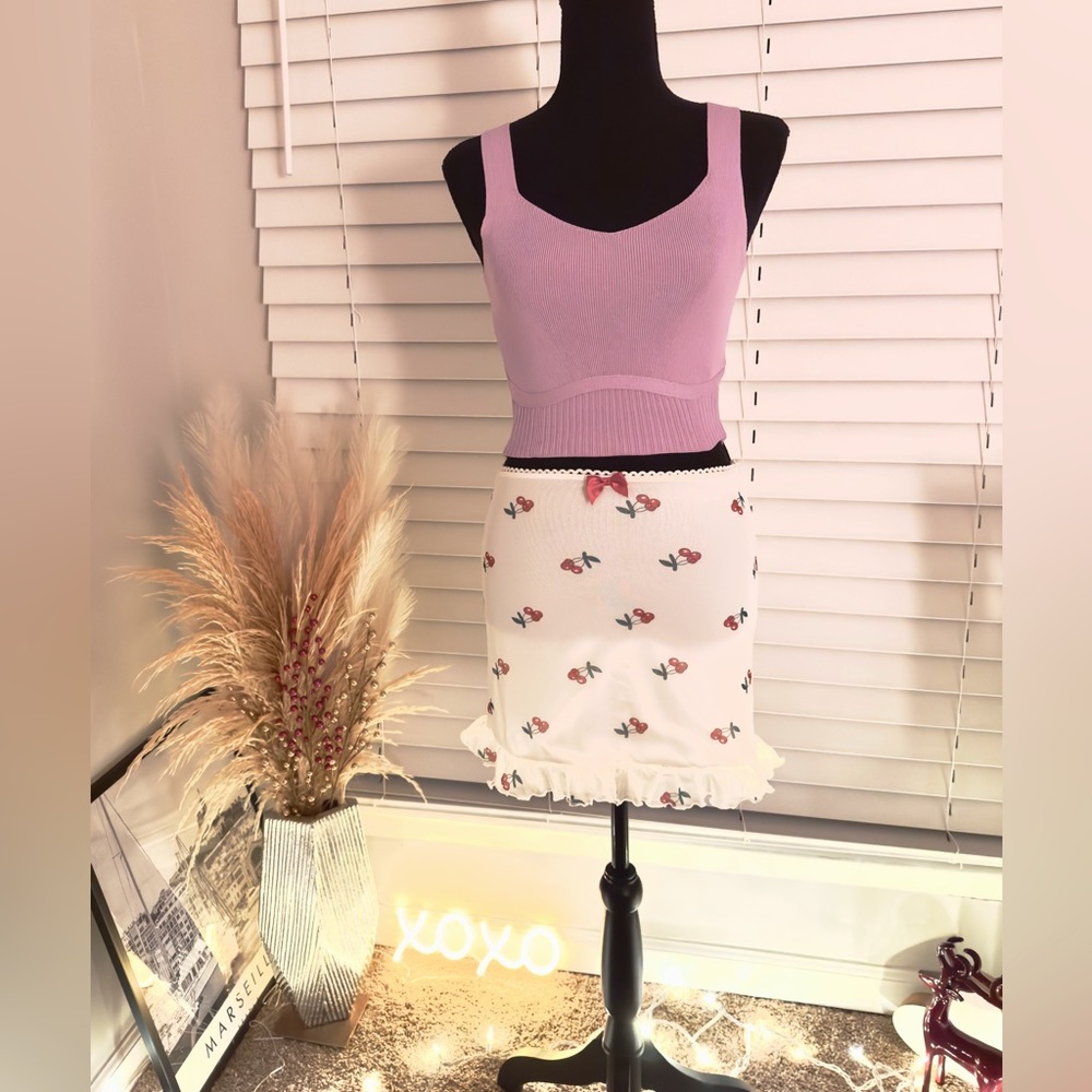 Dolls kill mini skirt white with cherry pattern in size S